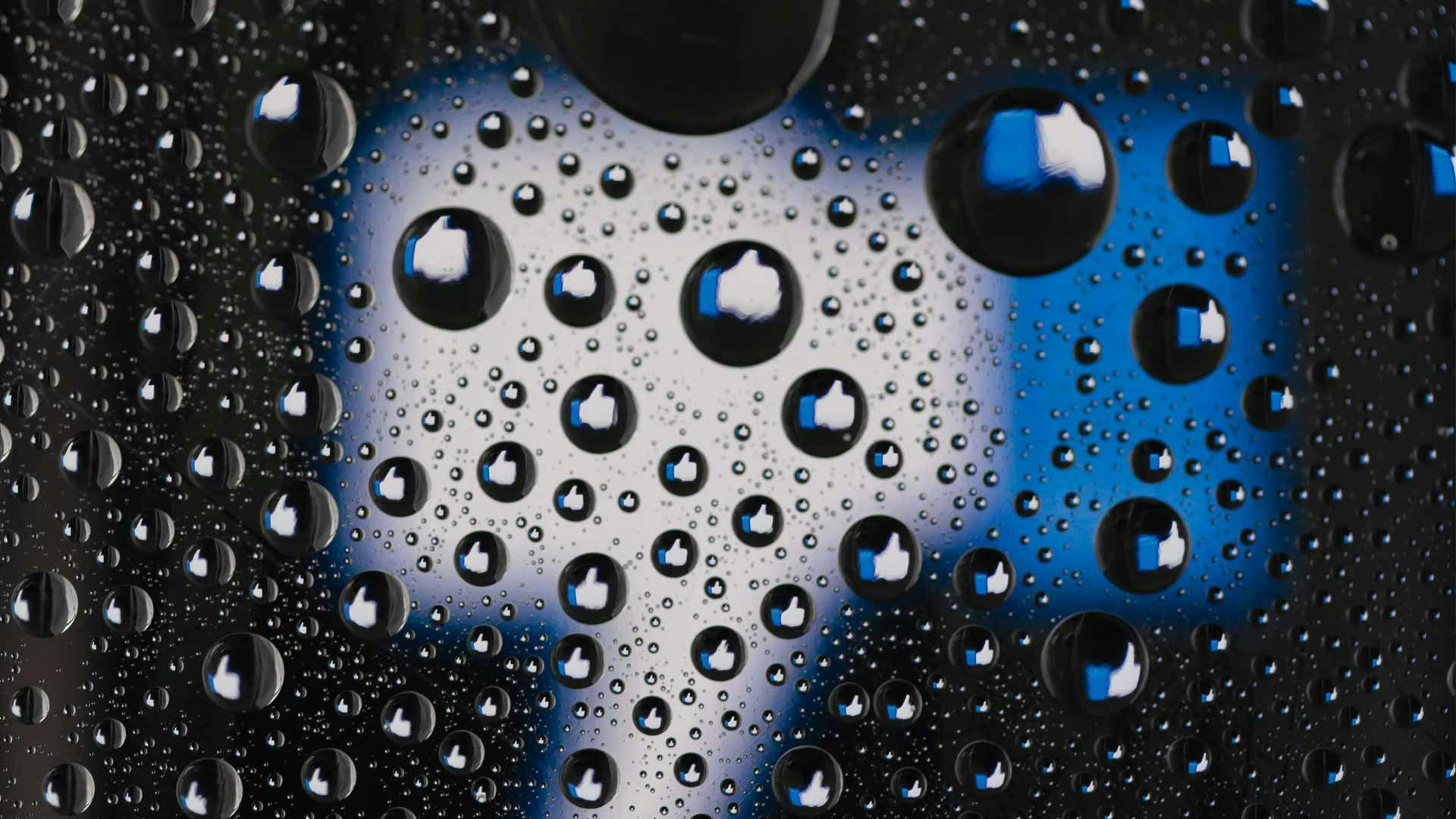Facebook Thumbs Down with Water Droplets